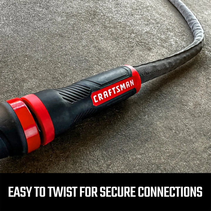 Craftsman hose connector CMXMHBB16549 in black and red, close-up view on gray surface.